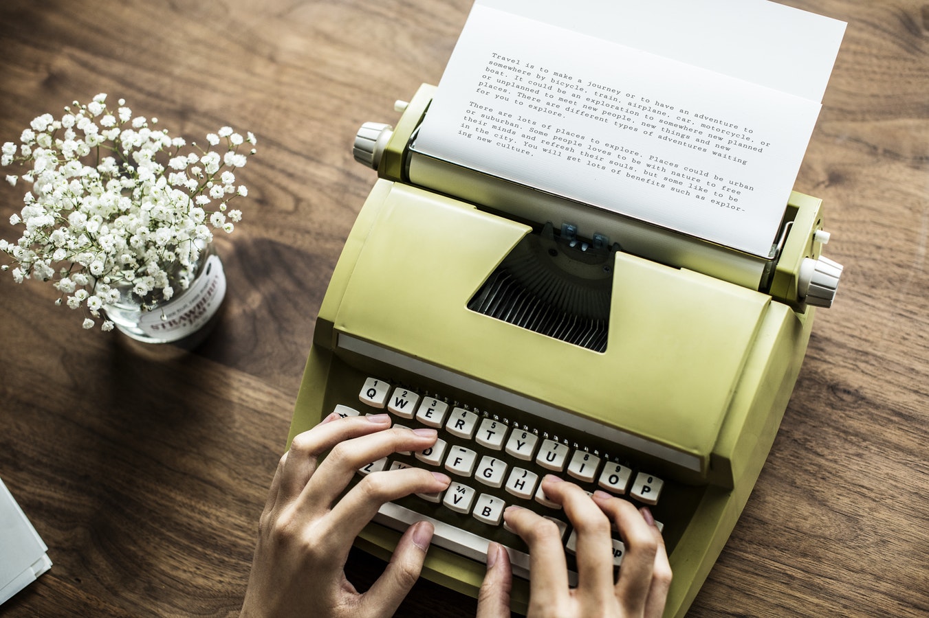 Writer's Group at Big Island default image depicting someone typing on typewriter