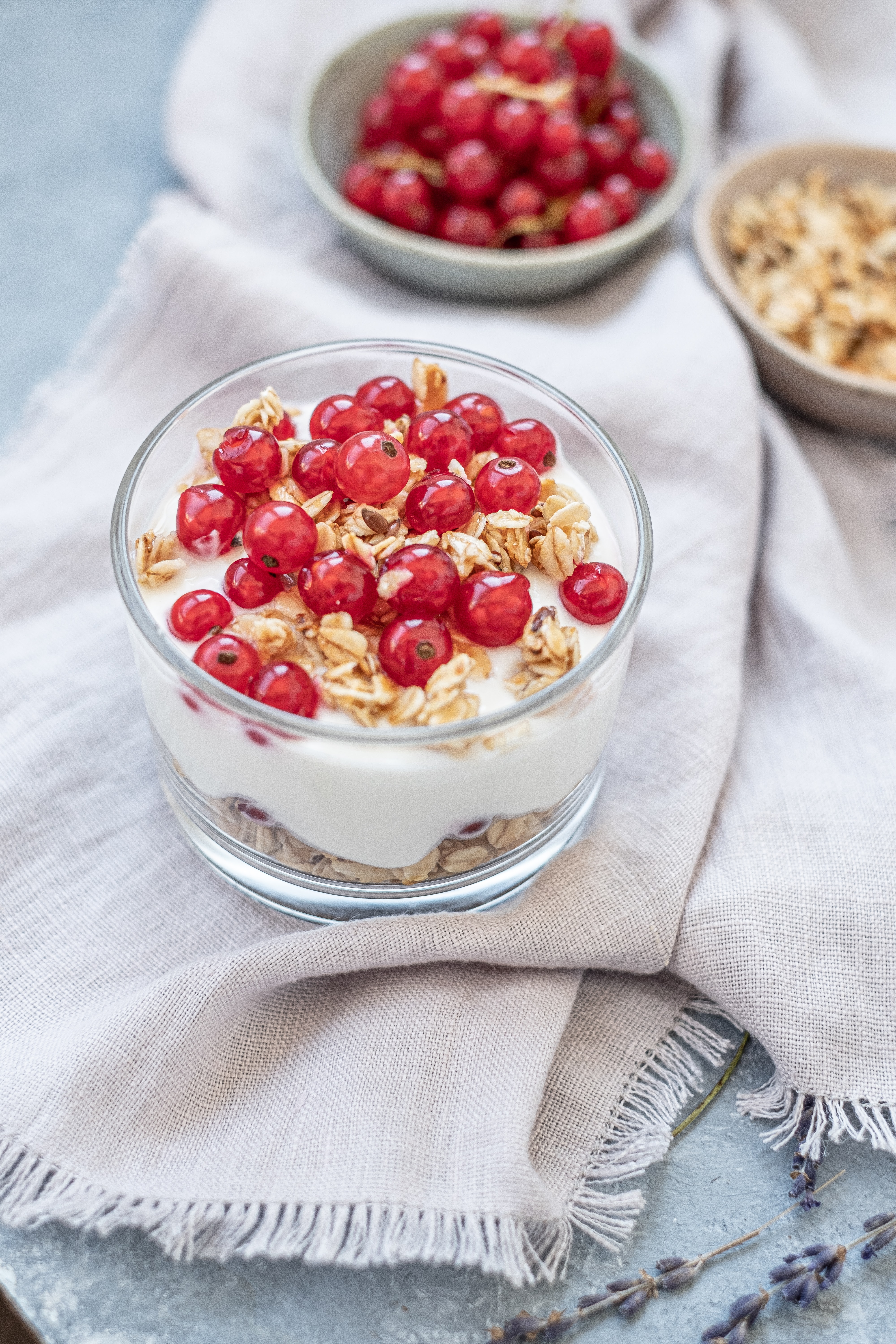 Yogurt with small berries and grains.