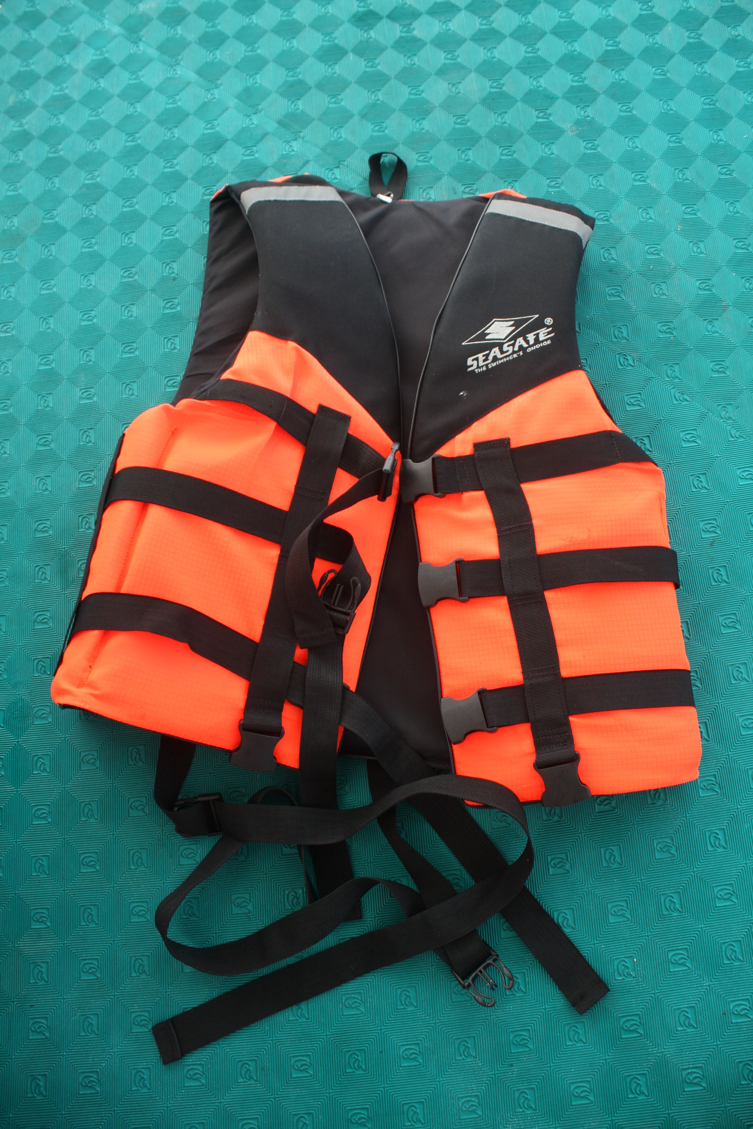 Orange and Black life vest.