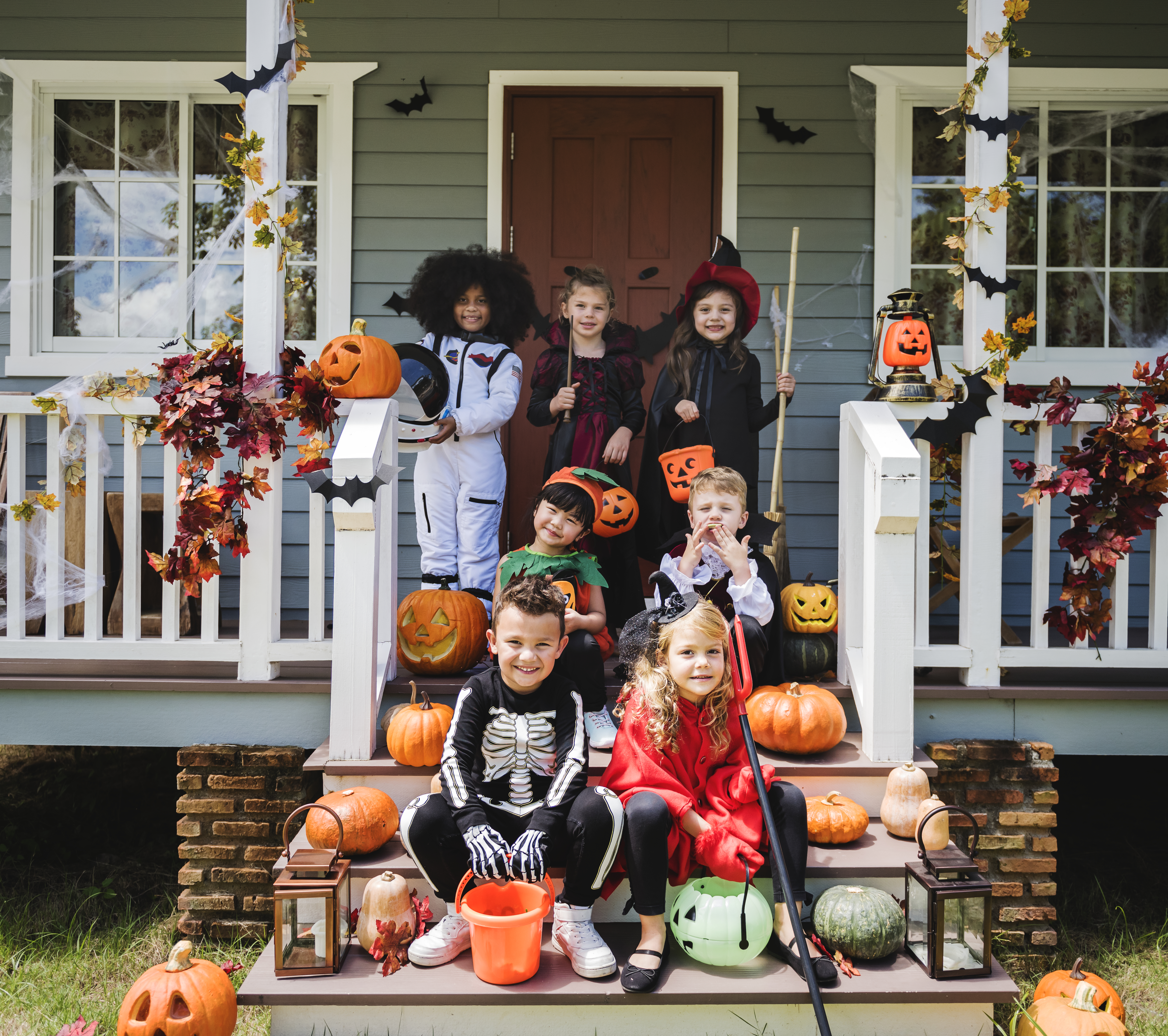 Children in Halloween costumes trick or treating.