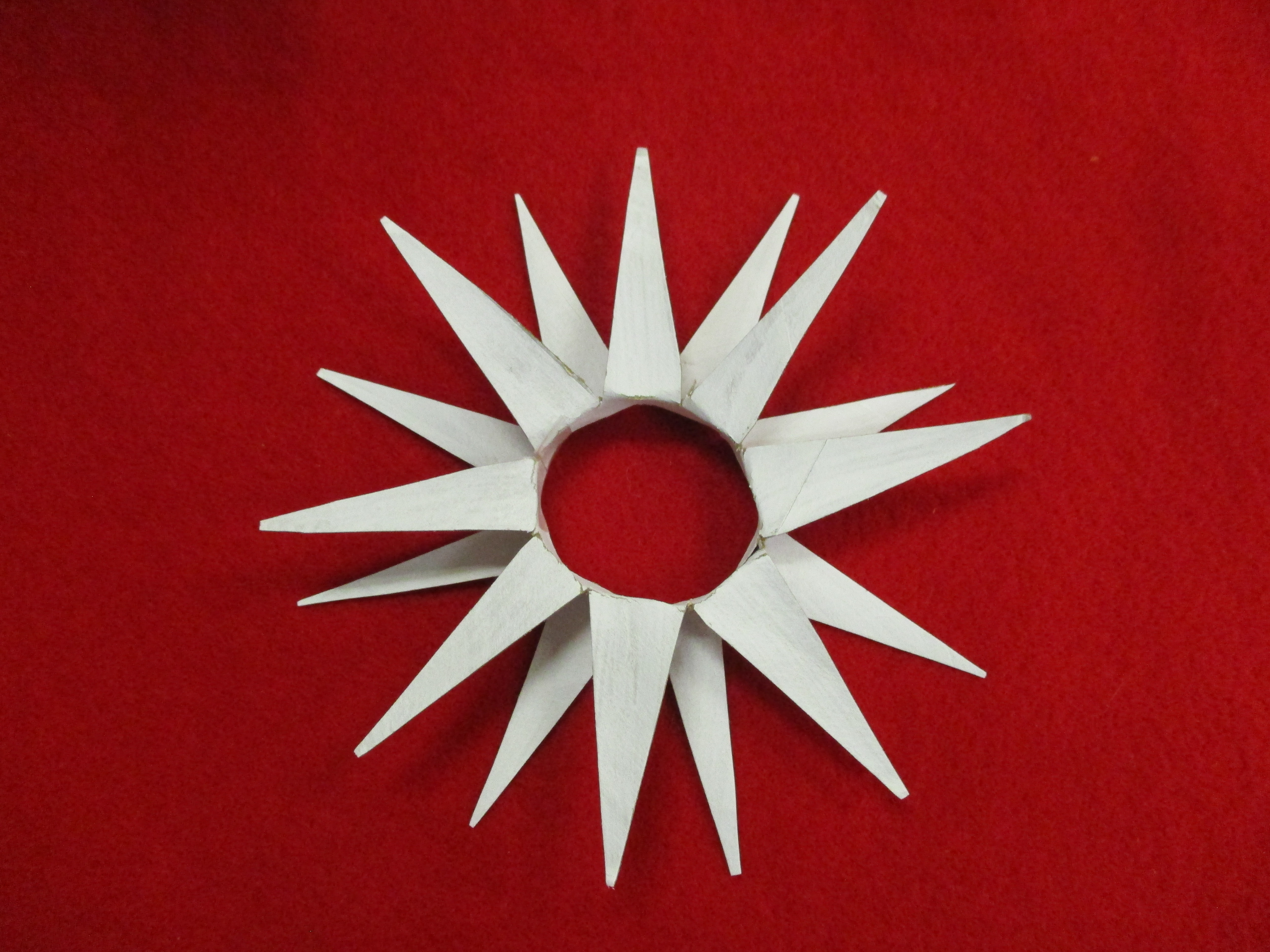 Paper star on a red background.
