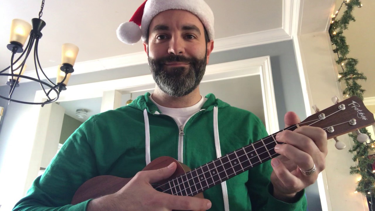 Photo of musician Mr. Jon wearing a Santa hat