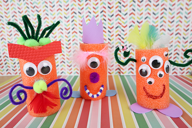 Monsters made out of pool noodles and craft supplies.