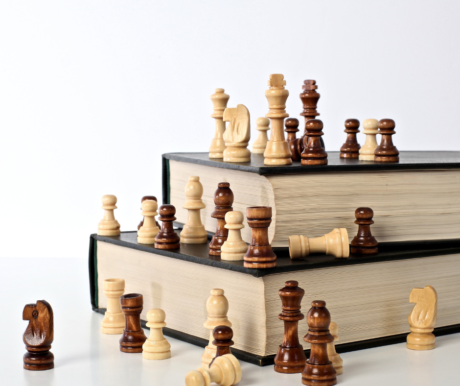 Chess Pieces on Books