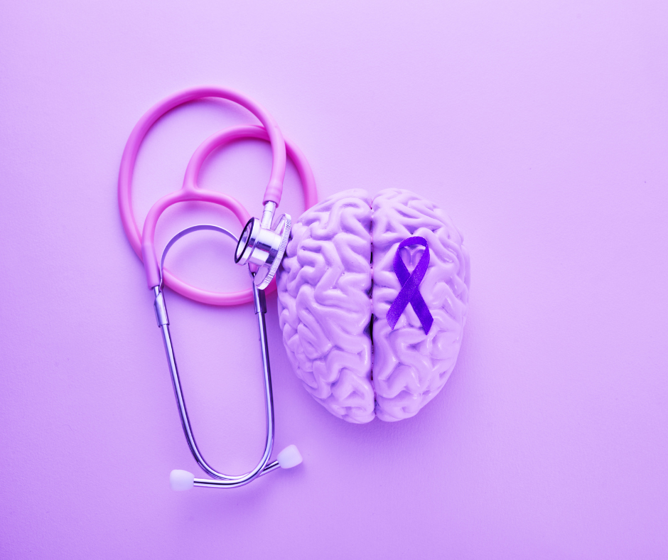 Purple brain with a purple ribbon and a pink stethoscope.