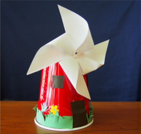 Windmill made out of a cup and paper.