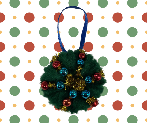 Wreath ornament on a polka dot backdrop