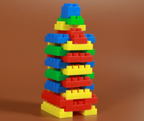 Tower of Legos on a brown background