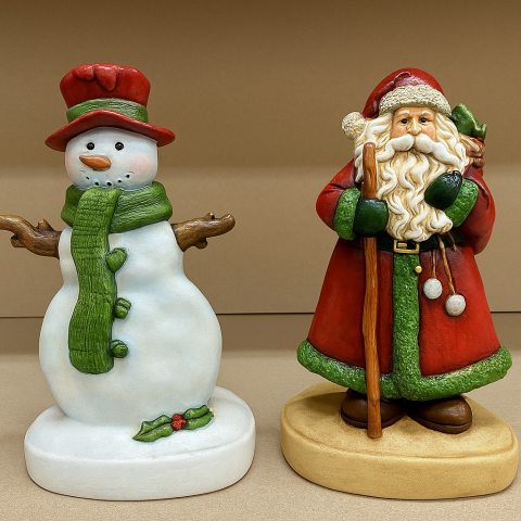 Painted snowman and Santa tea light holders.