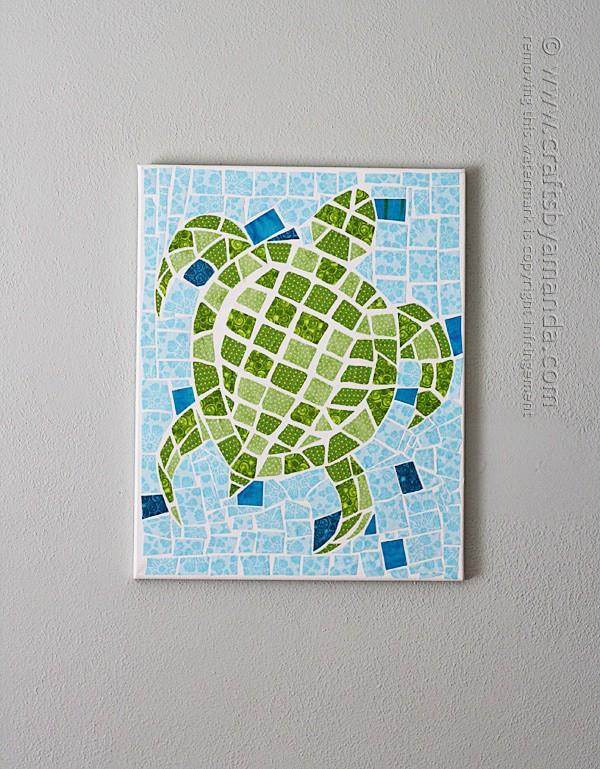 Fabric mosaic turtle on canvas.