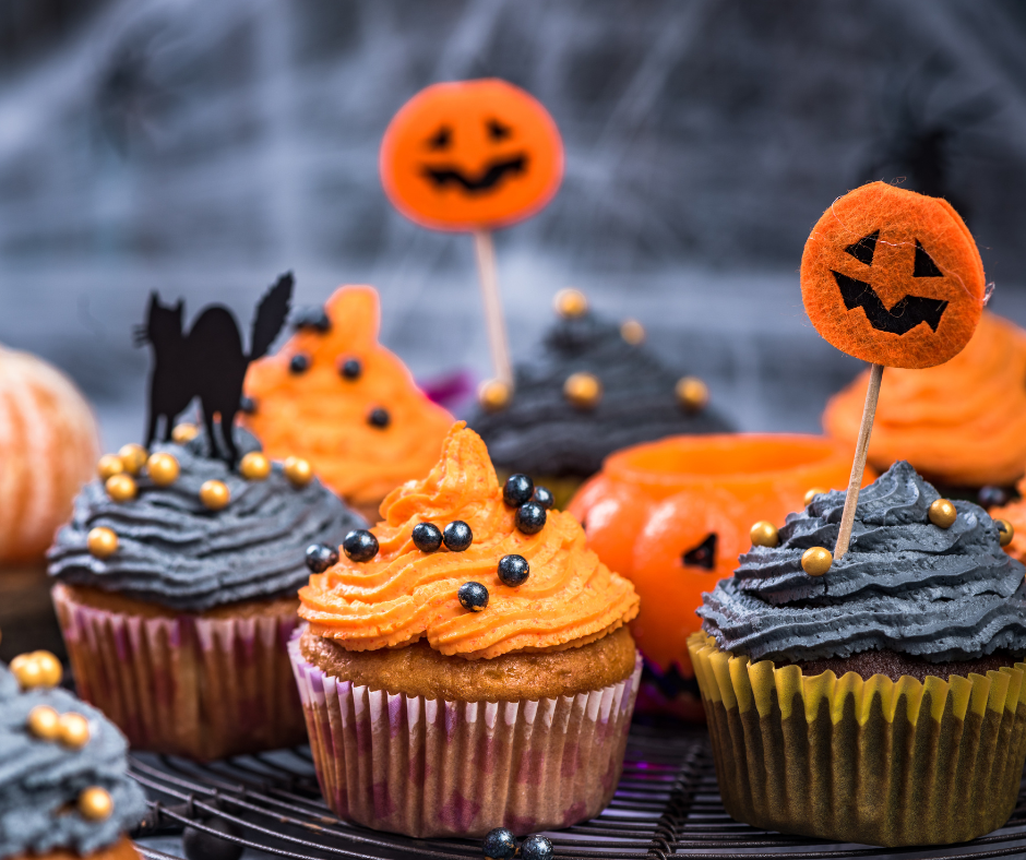 Orange and black cupcakes.